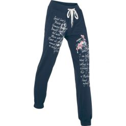 Spodnie sportowe, długie, Level 1 bonprix ciemnoniebieski z nadrukiem. Niebieskie spodnie damskie bonprix. Za 99,99 zł.