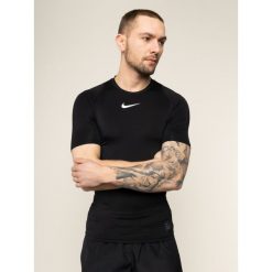 Koszulka techniczna NIKE Pro 838091. Czerwone koszulki męskie Nike, m, bez wzorów, z elastanu, sportowe, polo, bez rękawów. Za 119,00 zł.