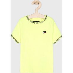 Tommy Hilfiger - T-shirt dziecięcy 104-176 cm. Żółte t-shirty chłopięce marki TOMMY HILFIGER, z nadrukiem, z bawełny, bez rękawów. Za 159,90 zł.