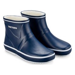 Kalosze w kolorze granatowym. Niebieskie buty zimowe damskie Tretorn, z tkaniny. W wyprzedaży za 159,95 zł.