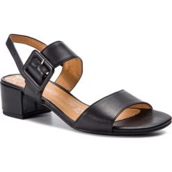 Sandały MARCO TOZZI - 2-28215-22 Black 001. Czarne klapki damskie Marco Tozzi, bez wzorów, ze skóry, bez obcasa, na obcasie. Za 189,90 zł.