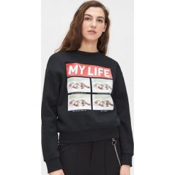 Bluza z kotem - Czarny. Czarne bluzy damskie Cropp, s, bez wzorów, bez rękawów, bez kaptura. Za 49,99 zł.