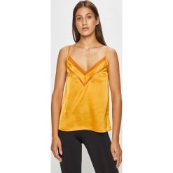 Etam - Top piżamowy Coco. Piżamy damskie Etam, s, bez wzorów, z elastanu, bez rękawów. W wyprzedaży za 69,90 zł.