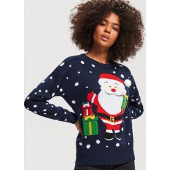 Sweter ze świątecznym motywem - Granatowy. Niebieskie swetry klasyczne damskie Reserved, l. Za 89,99 zł.