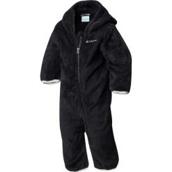 Kombinezon polarowy "Youth Foxy Baby" w kolorze antracytowym. Szare kombinezony niemowlęce Columbia, bez wzorów, z polaru, bez rękawów, bez kaptura. W wyprzedaży za 79,95 zł.