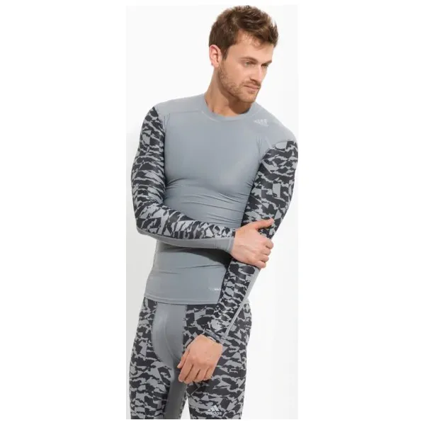 Adidas Koszulka Ls Tf Tee Ls Ci Gx. , szary, rozmiar M. Szare koszulki męskie Adidas, m, bez wzorów, ze skóry, biznesowe, bez kołnierzyka, bez rękawów. W wyprzedaży za 139,99 zł.