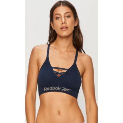 Reebok - Biustonosz sportowy. Czerwone biustonosze sportowe damskie Reebok, s, bez wzorów, z elastanu. Za 89,90 zł.