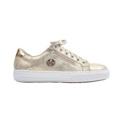 Rieker Buty kolor złota female żółty/pomarańczowy 42. Żółte buty sportowe damskie Rieker, z syntetyku, eleganckie. Za 279,00 zł.