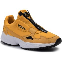 Buty adidas - Falcon Zip W EE5113 Actgol/Cblack/Ftwwht. Żółte półbuty damskie Adidas, na co dzień, bez wzorów, ze skóry, bez obcasa, na płaskiej podeszwie, bez zapięcia. Za 499,00 zł.