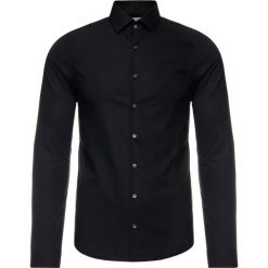 Koszula Calvin Klein K10K104095. Czarne koszule męskie Calvin Klein, m, bez wzorów, z elastanu, casualowe, bez kołnierzyka, bez rękawów. W wyprzedaży za 189,00 zł.