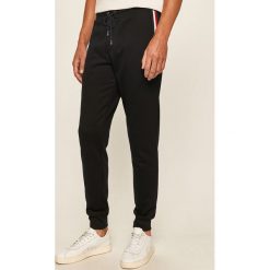 Tommy Hilfiger - Spodnie. Szare spodnie męskie TOMMY HILFIGER, s, z aplikacjami, z bawełny. Za 539,90 zł.