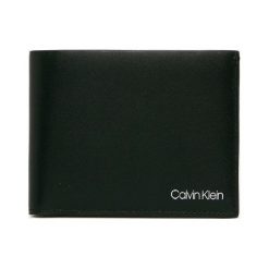 Calvin Klein - Portfel skórzany. Czarne portfele męskie Calvin Klein, bez wzorów, ze skóry. Za 359,90 zł.