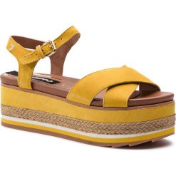 Espadryle GIOSEPPO - 48565 Mustard. Żółte espadryle damskie Gioseppo, bez wzorów, ze skóry, bez obcasa, na obcasie. W wyprzedaży za 199,00 zł.