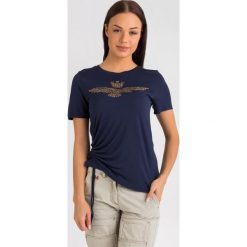 T-SHIRT aeronautica militare. T-shirty damskie Aeronautica Militare, s, bez wzorów, z materiału, bez kołnierzyka. W wyprzedaży za 407,20 zł.