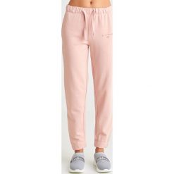 SPODNIE DRESOWE john richmond sport. Różowe spodnie damskie John Richmond Sport, m, z dresówki, sportowe. Za 289,00 zł.