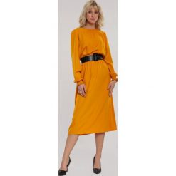 Żółta Sukienka Lexia. Żółte sukienki damskie Renee, s, eleganckie, z okrągłym kołnierzem, długie, midi, proste. Za 79,99 zł.