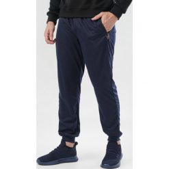 Granatowe Spodnie Dresowe Iphisorin. Niebieskie spodnie męskie Born2be, xl, bez wzorów, z dresówki. Za 39,99 zł.