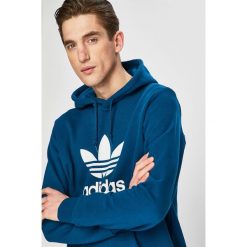 Adidas Originals - Bluza. Niebieskie bluzy męskie adidas Originals, m, z nadrukiem, z elastanu, z kapturem, bez rękawów, z kapturem. W wyprzedaży za 199,90 zł.