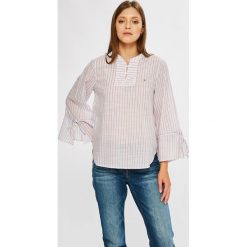Tommy Jeans - Bluzka. Niebieskie bluzki damskie Tommy Jeans, na co dzień, s, bez wzorów, z bawełny, casualowe, ze stójką, z krótkim rękawem. W wyprzedaży za 159,90 zł.