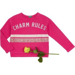 Bluza w kolorze różowym. Różowe bluzy niemowlęce Benetton Kids, w paski, bez rękawów, bez kaptura. W wyprzedaży za 35,95 zł.