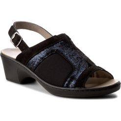 Sandały SCHOLL - Maniola Stretch Sandal F26739 1004 Black. Czarne klapki damskie Scholl, bez wzorów, ze skóry, bez obcasa, na obcasie. W wyprzedaży za 239,00 zł.