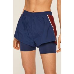 Tommy Sport - Szorty. Niebieskie spodenki sportowe damskie Tommy Sport, s, bez wzorów, z elastanu, sportowe. Za 299,90 zł.