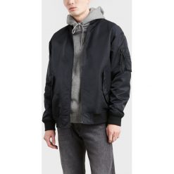 Levi's Kurtka Czarny Czerwony. Czerwone płaszcze męskie Levi's®, na wiosnę, s, bez wzorów, z materiału, bez kaptura. Za 671,95 zł.