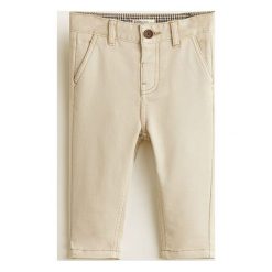 Mango Kids - Spodnie dziecięce 80-104 cm. Szare spodnie chłopięce marki Mango Kids, bez wzorów, z elastanu, casualowe. Za 69,90 zł.