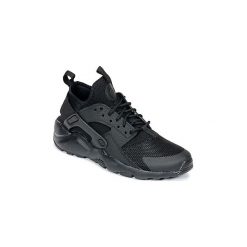 Buty Dziecko Nike AIR HUARACHE RUN ULTRA JUNIOR. Czarne trampki chłopięce marki Nike. Za 433,66 zł.