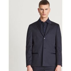 Marynarka z bawełny pima - Granatowy. Niebieskie marynarki męskie Reserved, m, bez wzorów, z bawełny. Za 399,99 zł.