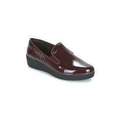 Tenisówki FitFlop SUPERSKATE. Czerwone trampki i tenisówki damskie marki FitFlop, bez wzorów, bez zapięcia. Za 335,20 zł.