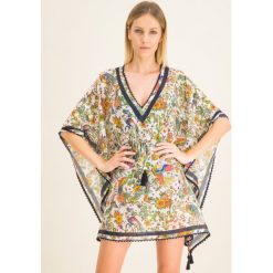 Sukienka plażowa Tory Burch Printed Short Caftan 58311. Sukienki damskie Tory Burch, na plażę, m, bez wzorów, z jedwabiu, bez kołnierzyka, bez rękawów. W wyprzedaży za 1079,00 zł.