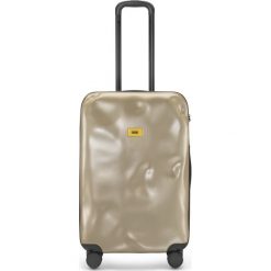Walizka Icon średnia złota. Żółte walizki Crash Baggage, bez wzorów, wakacyjne. Za 1204,00 zł.