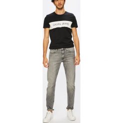 Calvin Klein Jeans - Jeansy CKJ 026. Szare jeansy męskie marki Calvin Klein Jeans, z elastanu. W wyprzedaży za 359,90 zł.