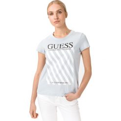 Guess Creamy Koszulka Niebieski. Niebieskie koszulki damskie Guess, m, z nadrukiem, z bawełny, bez kołnierzyka. Za 157,95 zł.