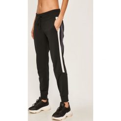 Dkny - Spodnie. Czarne spodnie damskie DKNY, s, z bawełny. Za 319,90 zł.