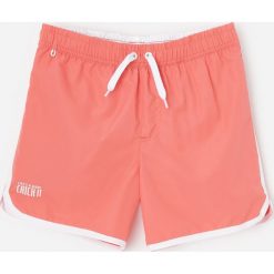 Szorty plażowe - Pomarańczowy. Pomarańczowe szorty damskie Reserved, bez wzorów. W wyprzedaży za 25,99 zł.