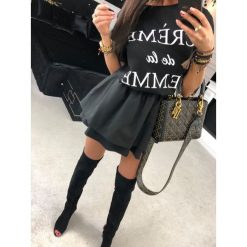 T-Shirt ,,FEMME’’ czarny. Czarne bluzki damskie Divinostyle, na co dzień, s, bez wzorów, z bawełny, bez kołnierzyka, bez rękawów. Za 79,00 zł.