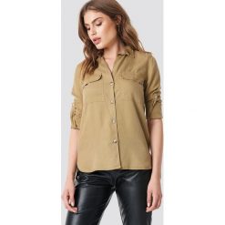 MANGO Koszula Roma - Beige. Brązowe koszule damskie marki Mango, bez wzorów, z lyocellu, z dekoltem na plecach, bez rękawów. Za 141,95 zł.
