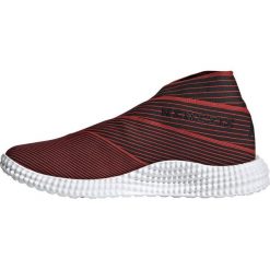 Buty piłkarskie adidas Nemeziz 19.1 Tr M F34731. Czerwone buty sportowe męskie Adidas, z materiału, bez zapięcia, do piłki nożnej. W wyprzedaży za 529,00 zł.
