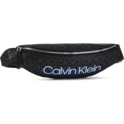 Saszetka nerka CALVIN KLEIN - Monogram Waistbag K60K605637 Black Mono. Czarne nerki damskie Calvin Klein, bez wzorów, ze skóry ekologicznej, młodzieżowe, bez dodatków. W wyprzedaży za 249,00 zł.