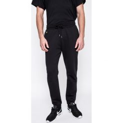 Puma - Spodnie Puma x XO The Weeknd. Czarne spodnie męskie Puma, na co dzień, m, bez wzorów, z elastanu, sportowe. W wyprzedaży za 239,90 zł.