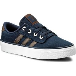 Buty adidas - Kiel CQ1089 Conavy/Brown/Ftwwht. Niebieskie buty sportowe damskie Adidas, z materiału, klasyczne. W wyprzedaży za 199,00 zł.