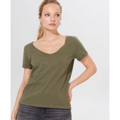 Koszulka z bawełny organicznej Eco Aware - Khaki. Brązowe koszulki damskie Mohito, s, bez wzorów, z bawełny, bez kołnierzyka, bez rękawów. Za 29,99 zł.