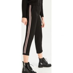 Spodnie chino - Wielobarwn. Szare chinosy damskie marki Sinsay, s. Za 69,99 zł.
