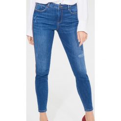 Jeansy skinny z lampasami - Niebieski. Niebieskie jeansy damskie Mohito. W wyprzedaży za 79,99 zł.