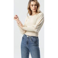 Jasnobeżowy Sweter Weber. Brązowe swetry damskie Born2be, na wiosnę, s, bez wzorów, z dzianiny, z długim rękawem, długie, bez kaptura. Za 99,99 zł.