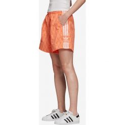 Adidas Originals Szorty Pomarańczowy. Pomarańczowe szorty damskie adidas Originals, bez wzorów, z materiału. Za 145,95 zł.