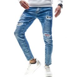 Spodnie jeansowe slim męskie niebieskie Recea. Niebieskie spodnie męskie Recea, s, z aplikacjami, z jeansu. Za 119,99 zł.