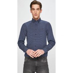 Tommy Hilfiger - Koszula. Niebieskie koszule męskie TOMMY HILFIGER, m, bez wzorów, z bawełny, casualowe, button down, z długim rękawem. W wyprzedaży za 259,90 zł.